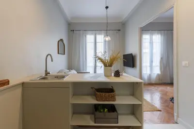a kitchen with a sink and a counter at Appartement moderne proche mer et transports in Nice