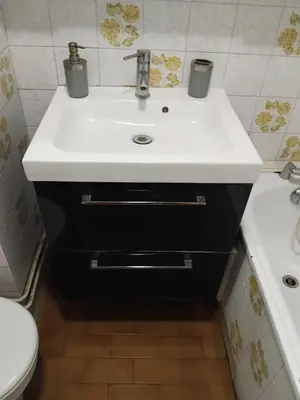 a bathroom with a white sink and a toilet at l'Or dans la Mer Partner in Nice