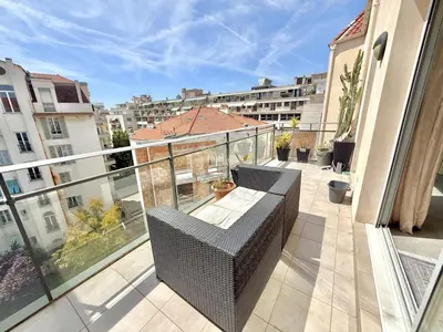 an apartment balcony with a view of a city at Studio Terrasse 3ème étage, climatisation coeur de Nice in Nice