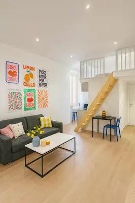 a living room with a couch and a table at Studio Masséna - Mer et Vieux Nice pour 4 personnes in Nice