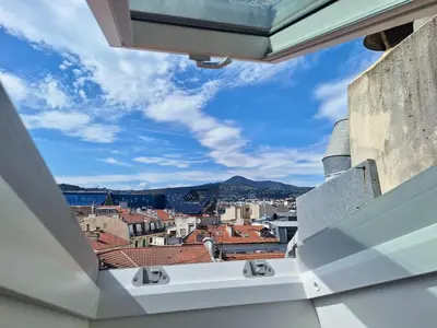 a view of a city from a window on a building at Lofty Hideout with 2 bedrooms in Nice
