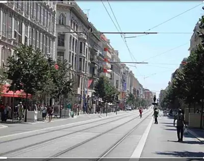 an empty city street with people walking down the street at Agréable studio cœur de Nice in Nice