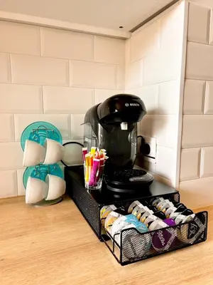 a black coffee maker sitting on top of a counter at Near Port & City - Private Parking & Breakfast - Full apartment in Nice