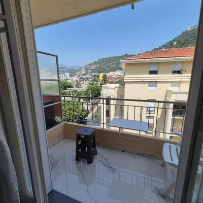 a balcony with a view of a building at Bahri House in Nice