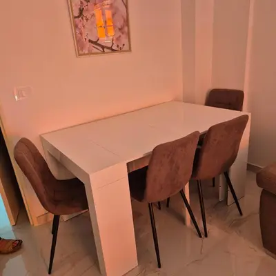 a white dining room table with chairs around it at Bahri House in Nice