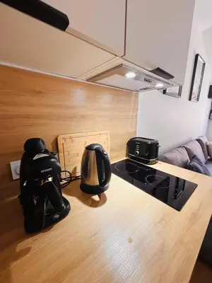 a kitchen with a tea kettle on a counter at Coin d'Amour Gambetta in Nice