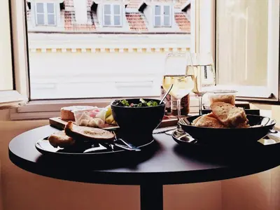 a table with two bowls of food and a plate of food at Coin d'Amour Gambetta in Nice