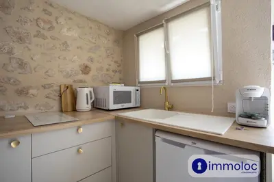 a kitchen with a counter top with a microwave at Studio in Villefranche in Villefranche-sur-Mer