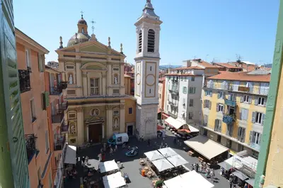an aerial view of a building with a clock tower at STE REPARATE - Cosy 2 pieces vue cathedrale in Nice