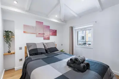 a bedroom with a bed with two towels on it at Nice Renting - 6B FRANCE - Massena beach design AC quiet center wifi in Nice