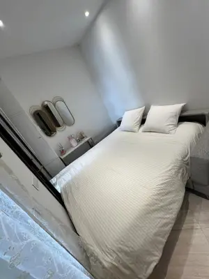 a bedroom with a large bed in a room at Cosmina Residence in Nice