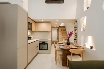 a staircase in a house with wooden steps at KALLISTE - NEW AC- Old town-Walk to everything - Beach- Restaurants-Supermarkets in Nice