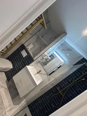 a glass counter top with a sink in a room at MOON 21 in Nice