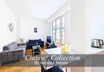 a living room with a couch and a table at Nestor&Jeeves - GOLDEN SQUARE - Near Promenade des Anglais in Nice
