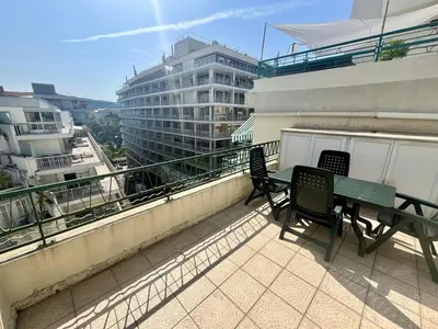 a balcony with a table and chairs on a building at Nice Signature Halevy Terrasse in Nice