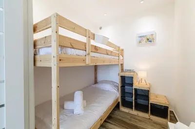 a bunk bed room with two bunk beds at Sea View & Terrace Promenade des Anglais in Nice