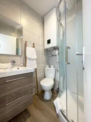 a bathroom with a toilet and a sink and a shower at Studio en plein centre de Nice, proche Tramway in Nice
