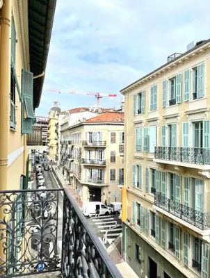 a view from a balcony of a city with buildings at Charming & roomy apartment with balcony heart of Nice in Nice