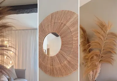 a round mirror on a wall with a feather at Nestor&Jeeves - BEIGE RIVIERA - Standing suite in Nice