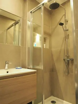 a bathroom with a shower and a sink at Nice Centre - Apartment with balcony and stunning sea view! in Nice