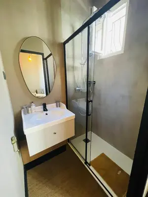 a bathroom with a sink and a mirror at L'Embarcadère - Port de Nice in Nice