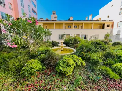 a view of a courtyard from the inside of a building at L'Embarcadère - Port de Nice in Nice