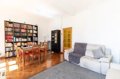 a living room with a couch and a table at HappyFew suite Palazzo in Nice