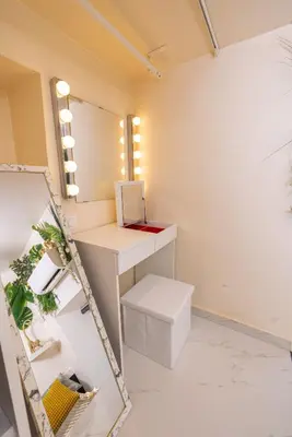 a bathroom with a vanity and a mirror at Duplex suite 50m de la plage Carré d'Or Nice in Nice