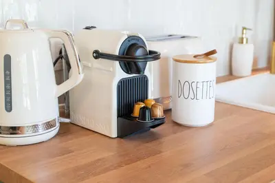 a coffee maker and a coffeemaker on a counter at Nice Renting - CROTTI - Authentic Immersion Sea & Beach Massena in Nice