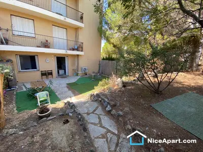 an aerial view of a house with a yard at Nice hillside with 100 sqm private garden in Nice
