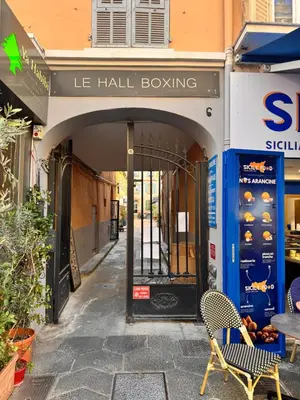 an entrance to a store with a revolving door at Bright, Central & Stylish 3 Min Walk to the Sea in Nice