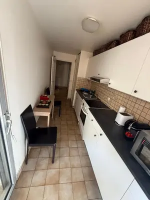 a bedroom with a large bed with candles on it at Cosy appartement, terrasse in Nice