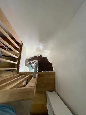 a room with stairs and a bed in a room at Room in city Nice in Nice