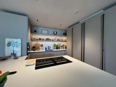 a kitchen with a stove top oven in a room at MONT BORON PALMS AP4480 by Riviera Holiday Homes in Nice