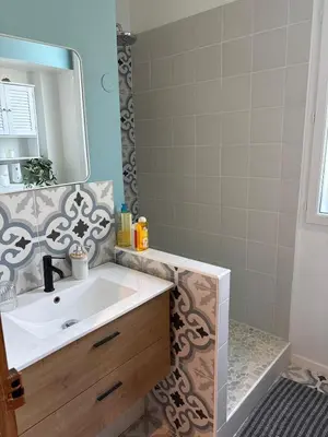 a bathroom with a sink and a mirror at Renovated F3 Parking Clim Nice Mont Boron in Nice