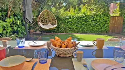 a table with a basket of bread on it at L'Éclat d'Azur in Nice