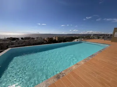 a swimming pool on the roof of a building at SEASIDE VIEW Saint Laurent in Saint-Laurent-du-Var