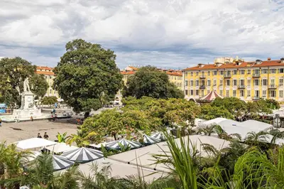 a view of a city with tents and buildings at Residence Garibaldi - Nice in Nice