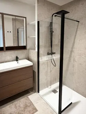 a bathroom with a shower and a sink at Nice Center - Spacious Luxury Apartment with Air Conditioning in Nice