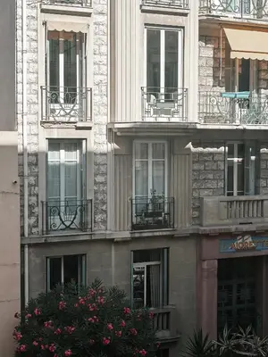 a building with balconies on the side of it at Nice Center - Spacious Luxury Apartment with Air Conditioning in Nice
