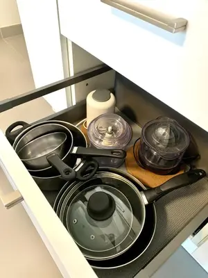 a stove top with pots and pans in a kitchen at Modern Studio by Port & Old Town in Nice