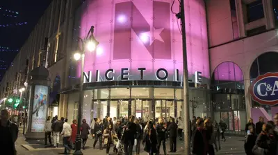 a large group of people walking in front of aindersforce building at Nice Renting - PAGANINI - New Lovely Cosy Flat in Heart of Nice in Nice