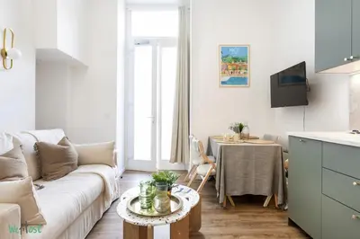 a kitchen with a sink and a washing machine at WeHost D4 - La Chic Cour 2 people Near sea in Nice