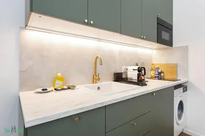 a bathroom with a white sink and a mirror at WeHost D4 - La Chic Cour 2 people Near sea in Nice