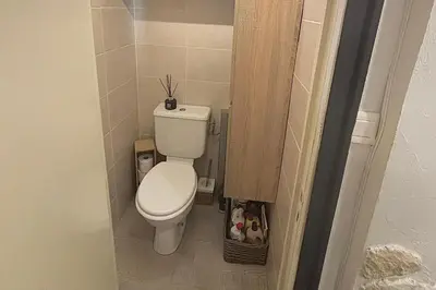 a bathroom with a toilet in a small room at Cosy one bedroom apartment to Nice in Nice