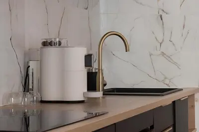 a kitchen with a counter with a coffee maker at Azur elegance AIR CONDITIONING Beach 8 min Sleeps 6 in Nice