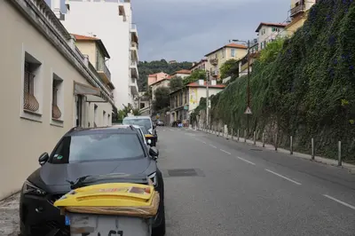 a car parked on the side of a street at Cozy apartment in Nice Est in Nice