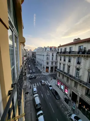 a view of a city street with cars and buildings at Cosy studio au Coeur du Centre Ville in Nice