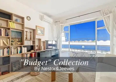 a living room with a view of the ocean at Nestor&Jeeves - LADY BLUE - Terrace - Close sea in Nice