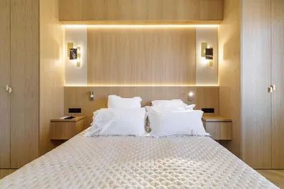 a bedroom with a large bed with white pillows at Outstanding View on the Promenade - Awesome 2 Bdr in Nice